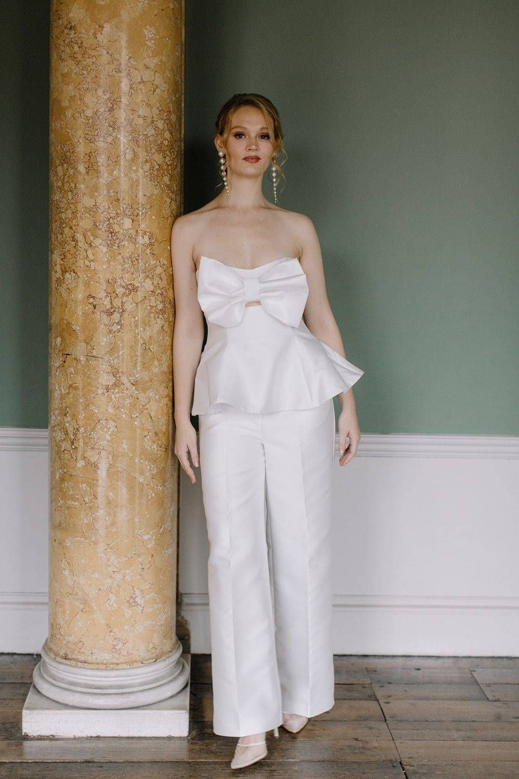 "Bride in a bespoke trouser and top bridal separates ensemble for a small intimate wedding by Kate Edmondson"