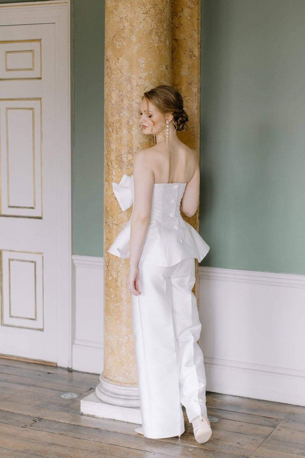"Bride in a bespoke trouser and top bridal separates ensemble for a small intimate wedding by Kate Edmondson"