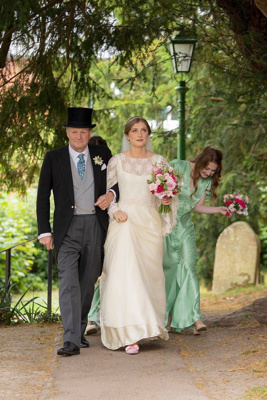 Bride wearing bespoke wedding dress by Kate Edmondson, Bespoke wedding dress designer London, Bridal designer near me,