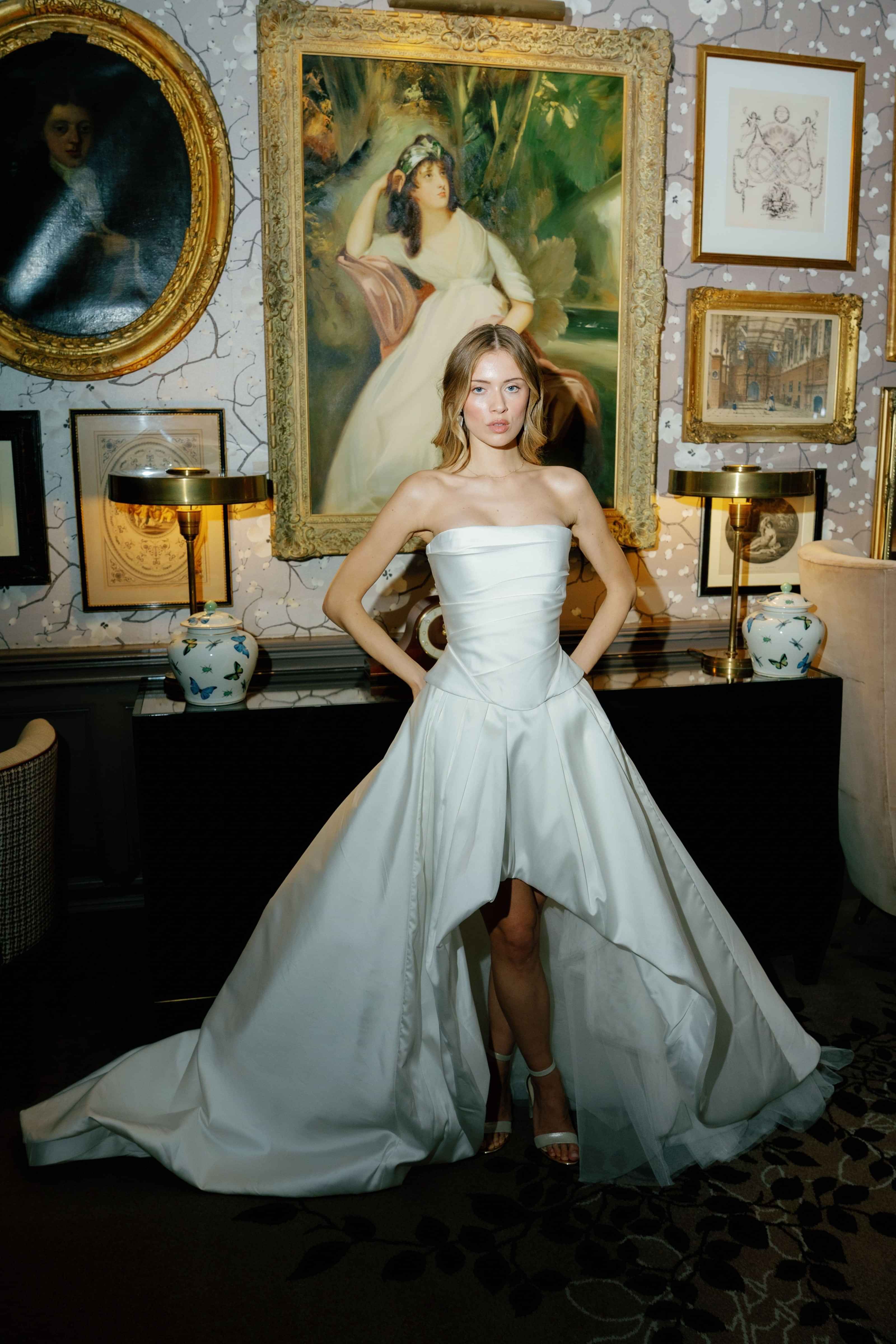 Elegant strapless bridal gown by Kate Edmondson