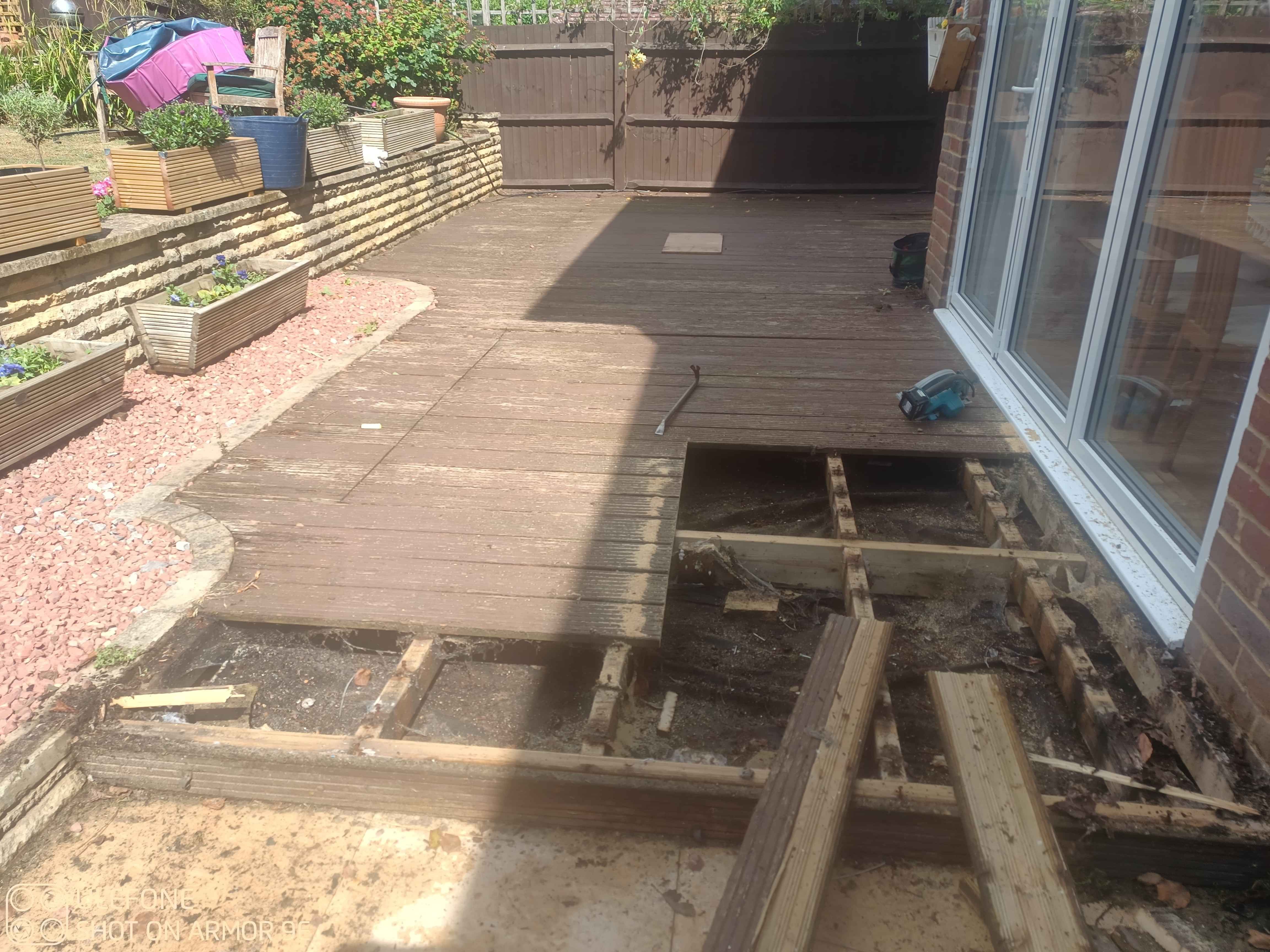 Ripping out the old timber decking