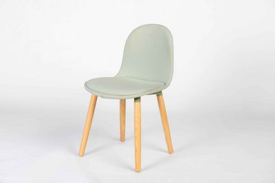KIN tub chair on 4 oak wood leg frame.