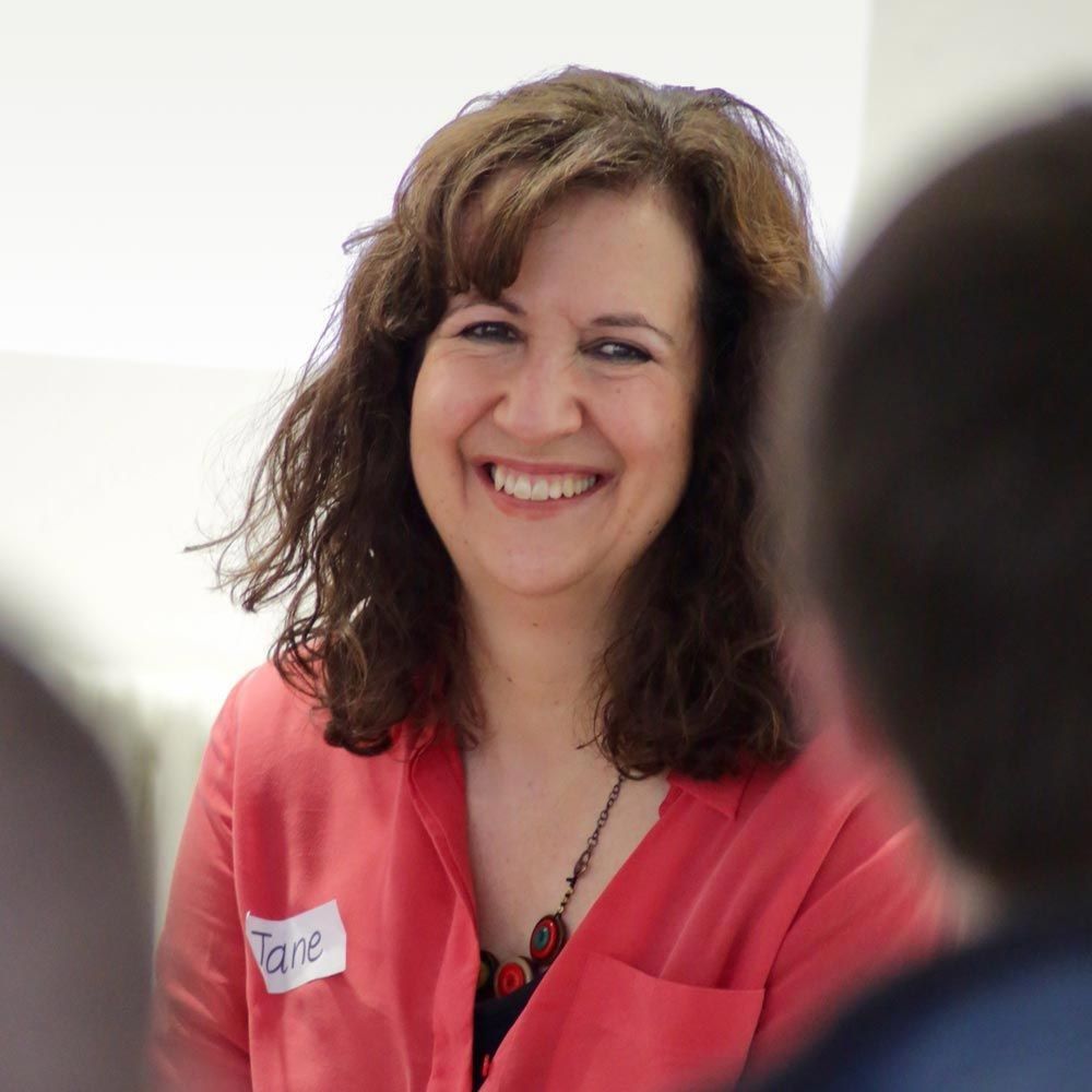 Jane smiling and talking