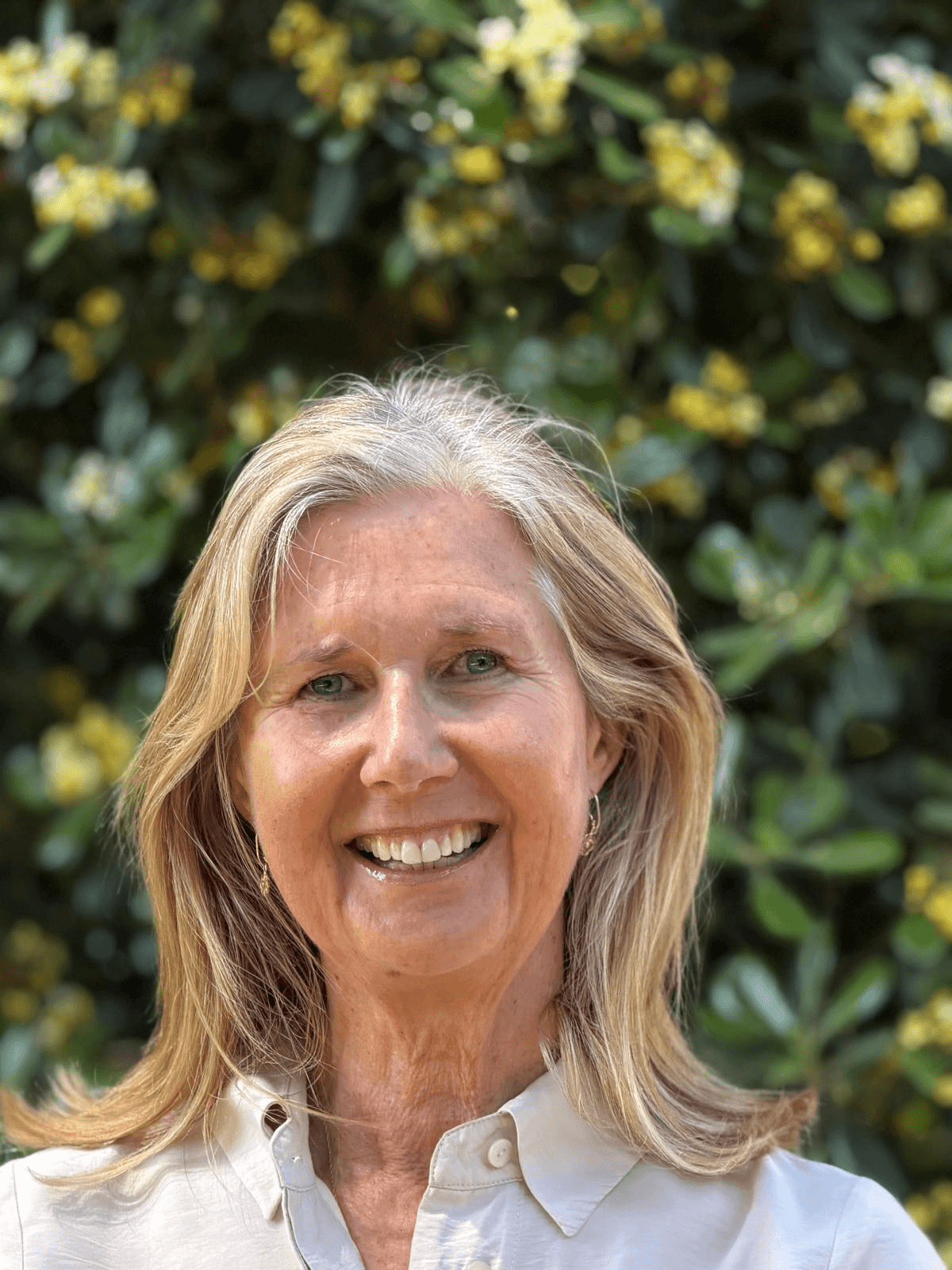 Image of Sarah Armitage. Sarah is smiling and has long blond hair and lightly tanned complexion
